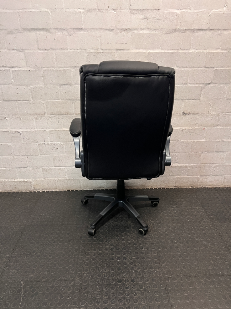 Black Mid-Back Swivel Office Chair with Contrast Stitching — Visible Wear; One Chair Has Unattached Armrests