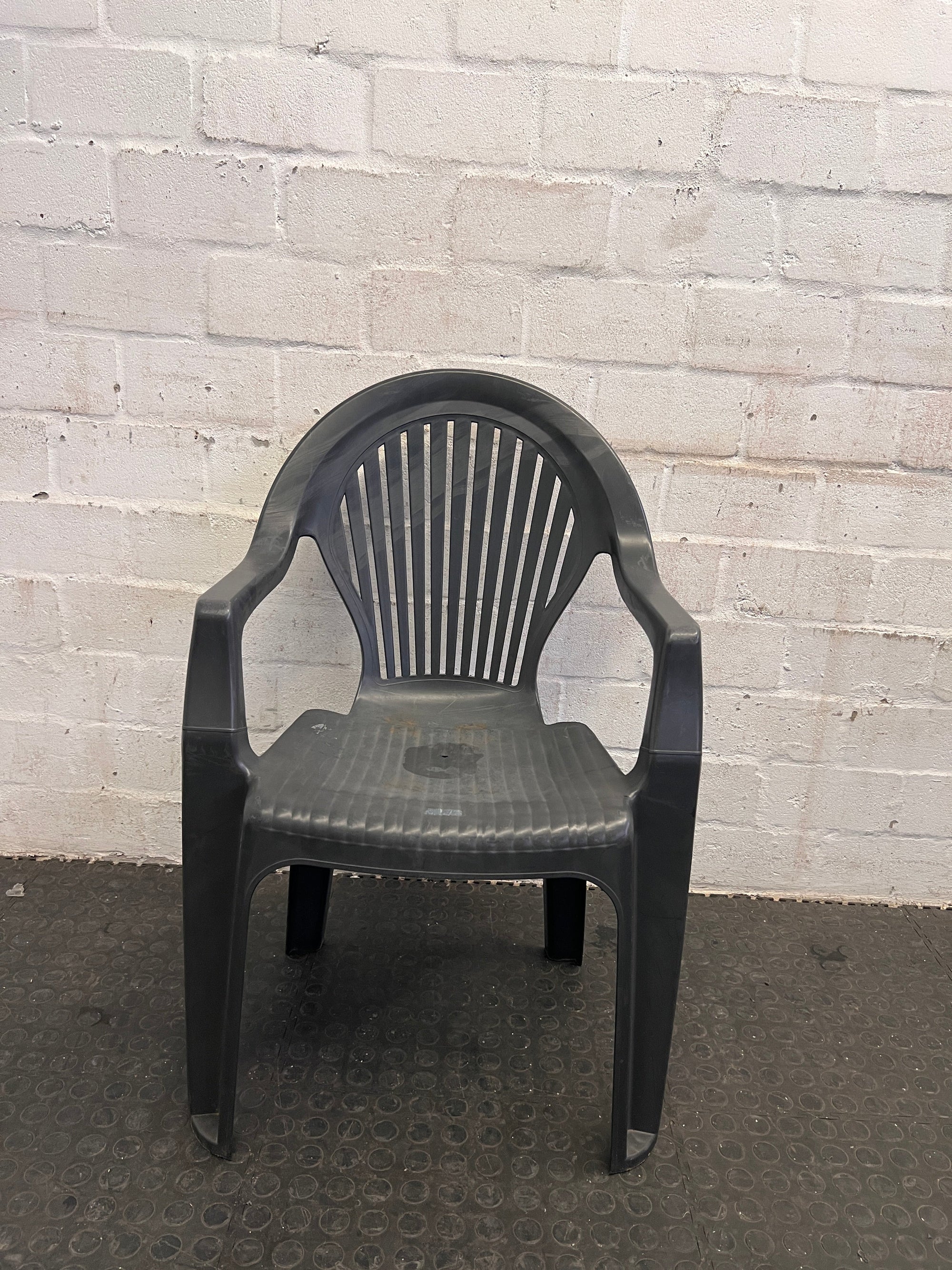 Black Plastic Ribbed Outdoor Chair