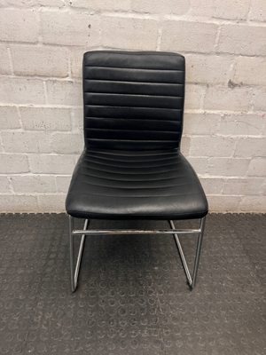 Black Ribbed Faux Leather Dining Chair with Chrome Frame — Small Tear on Seat Upholstery