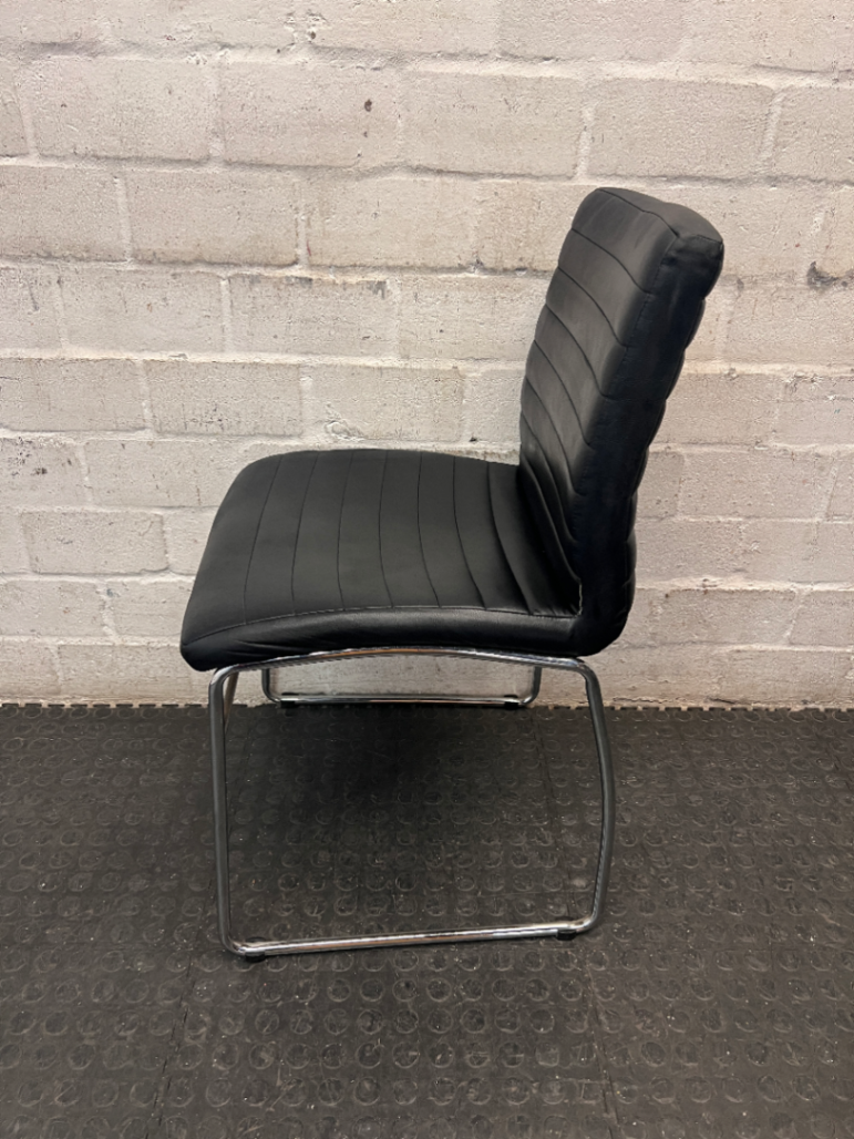 Black Ribbed Faux Leather Dining Chair with Chrome Frame — Small Tear on Seat Upholstery
