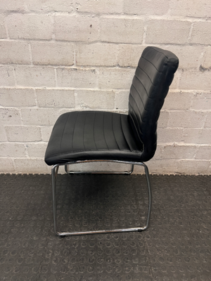 Black Ribbed Faux Leather Dining Chair with Chrome Frame — Small Tear on Seat Upholstery