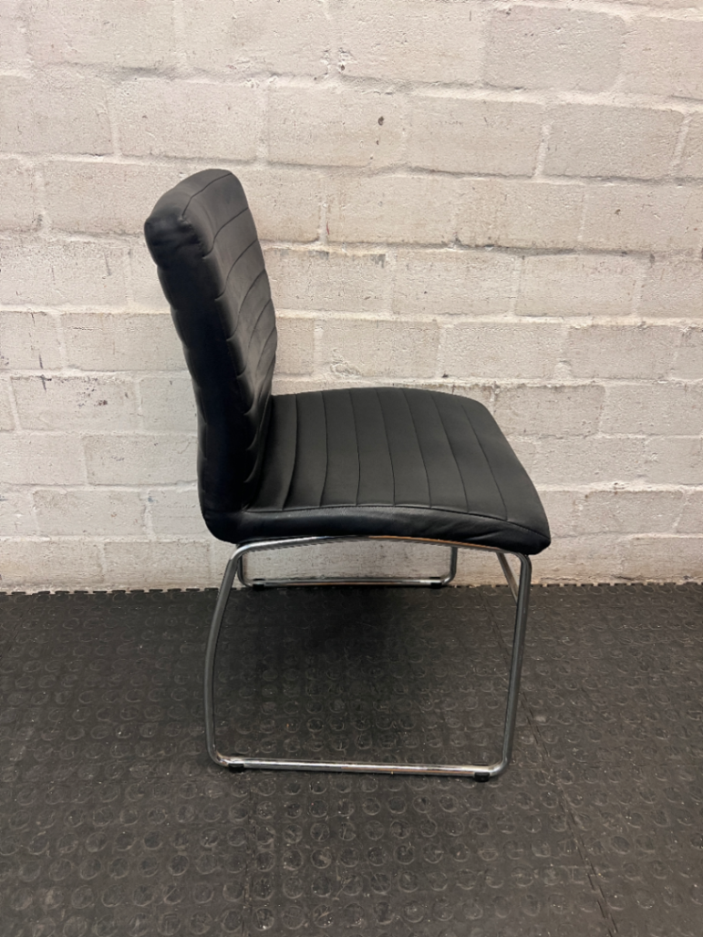 Black Ribbed Faux Leather Dining Chair with Chrome Frame — Small Tear on Seat Upholstery