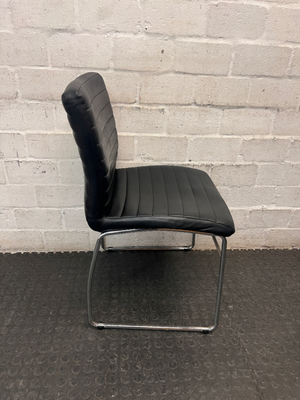 Black Ribbed Faux Leather Dining Chair with Chrome Frame — Small Tear on Seat Upholstery