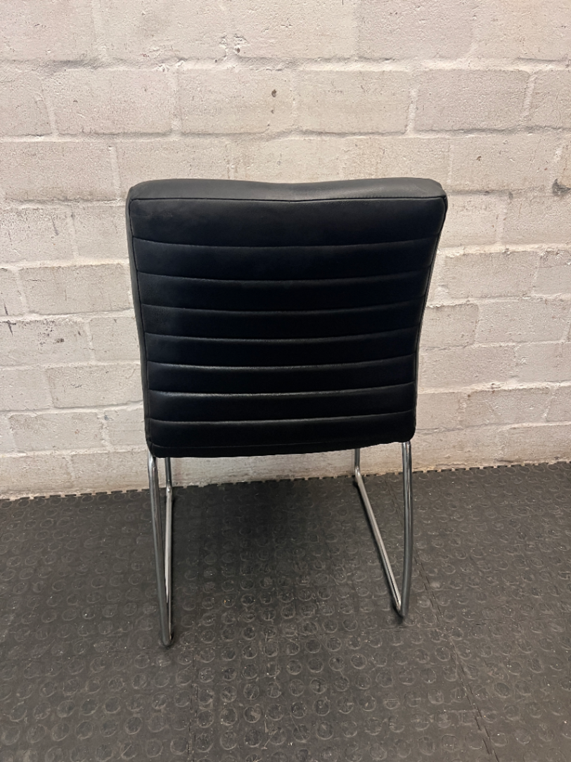 Black Ribbed Faux Leather Dining Chair with Chrome Frame — Small Tear on Seat Upholstery
