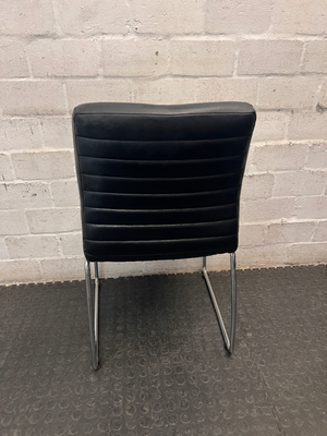 Black Ribbed Faux Leather Dining Chair with Chrome Frame — Small Tear on Seat Upholstery