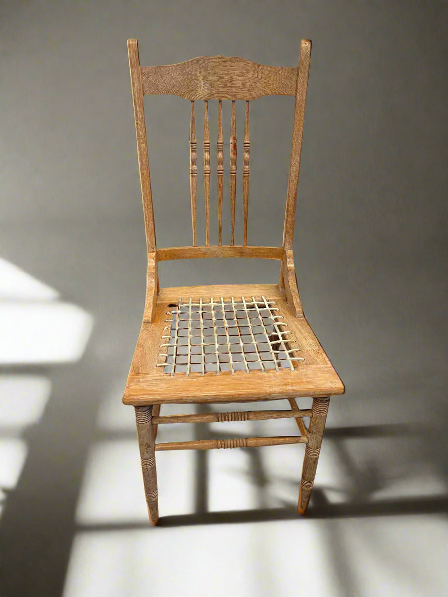 Charming Vintage Wooden Dining Chair with Minor Wear and Rattan Seat