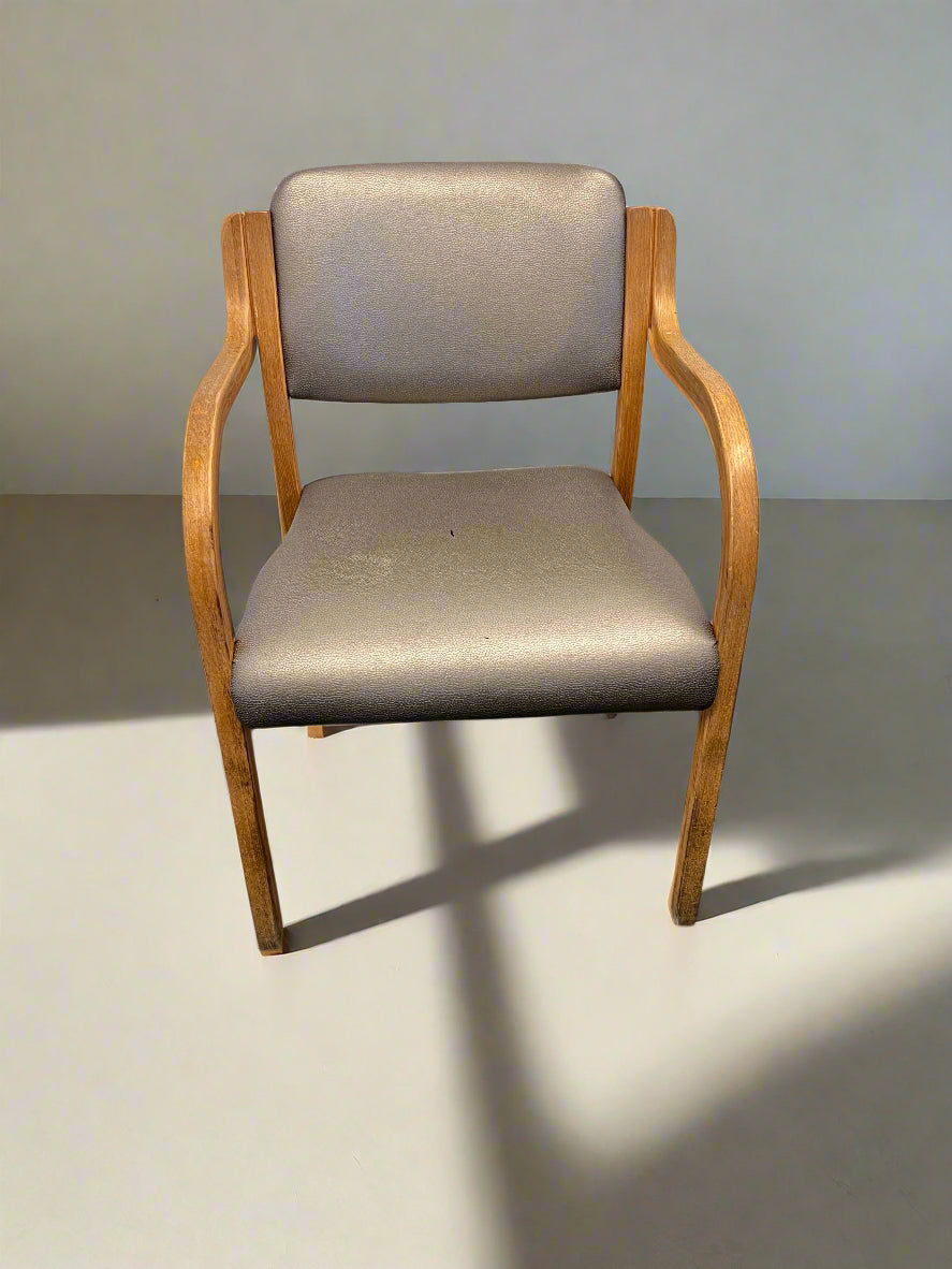 Chic Vintage Grey Vinyl Armchair with Wooden Frame