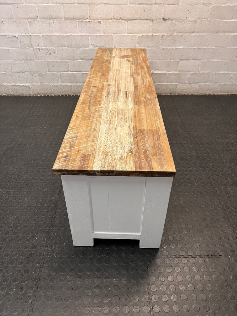 Cielo White and Natural Wood TV Unit — Mark from Candle Spillage on Surface