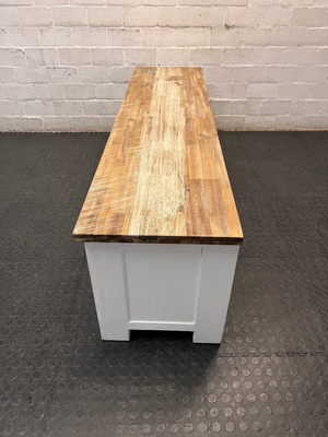 Cielo White and Natural Wood TV Unit — Mark from Candle Spillage on Surface