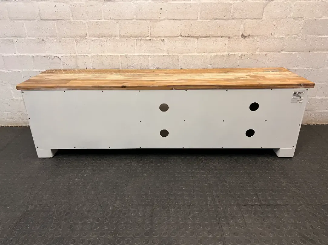 Cielo White and Natural Wood TV Unit — Mark from Candle Spillage on Surface