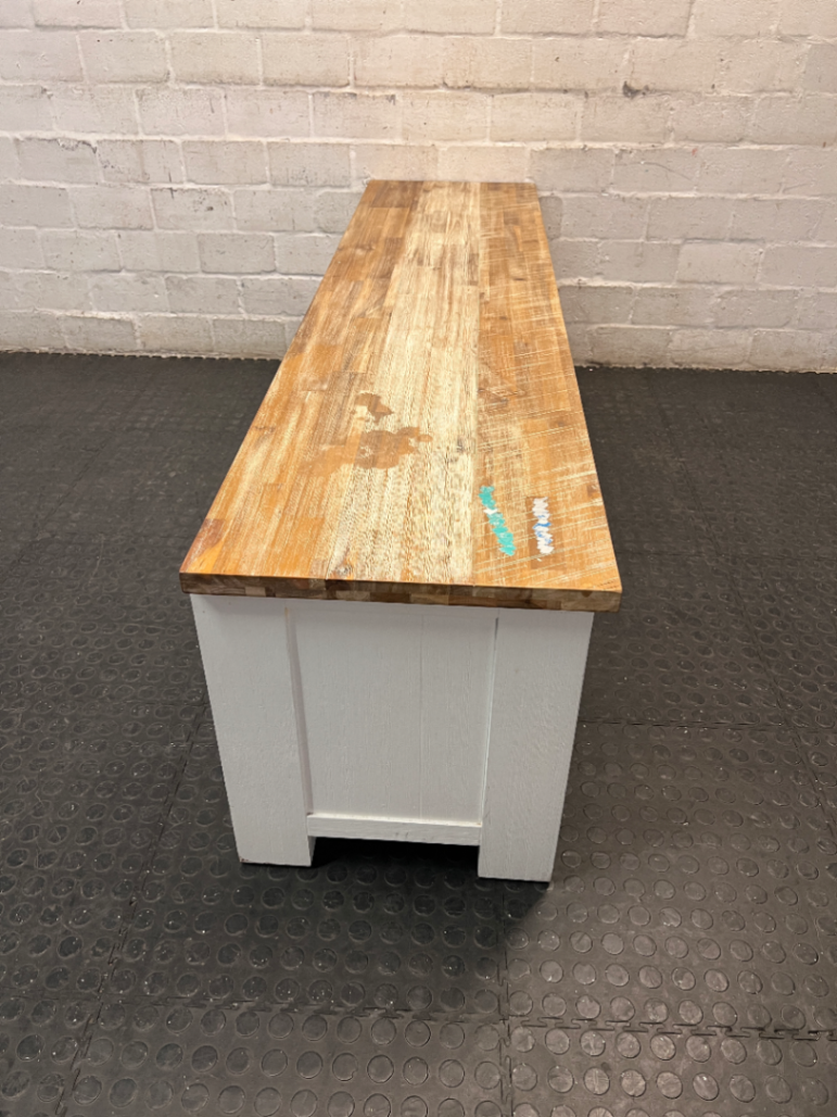 Cielo White and Natural Wood TV Unit — Mark from Candle Spillage on Surface