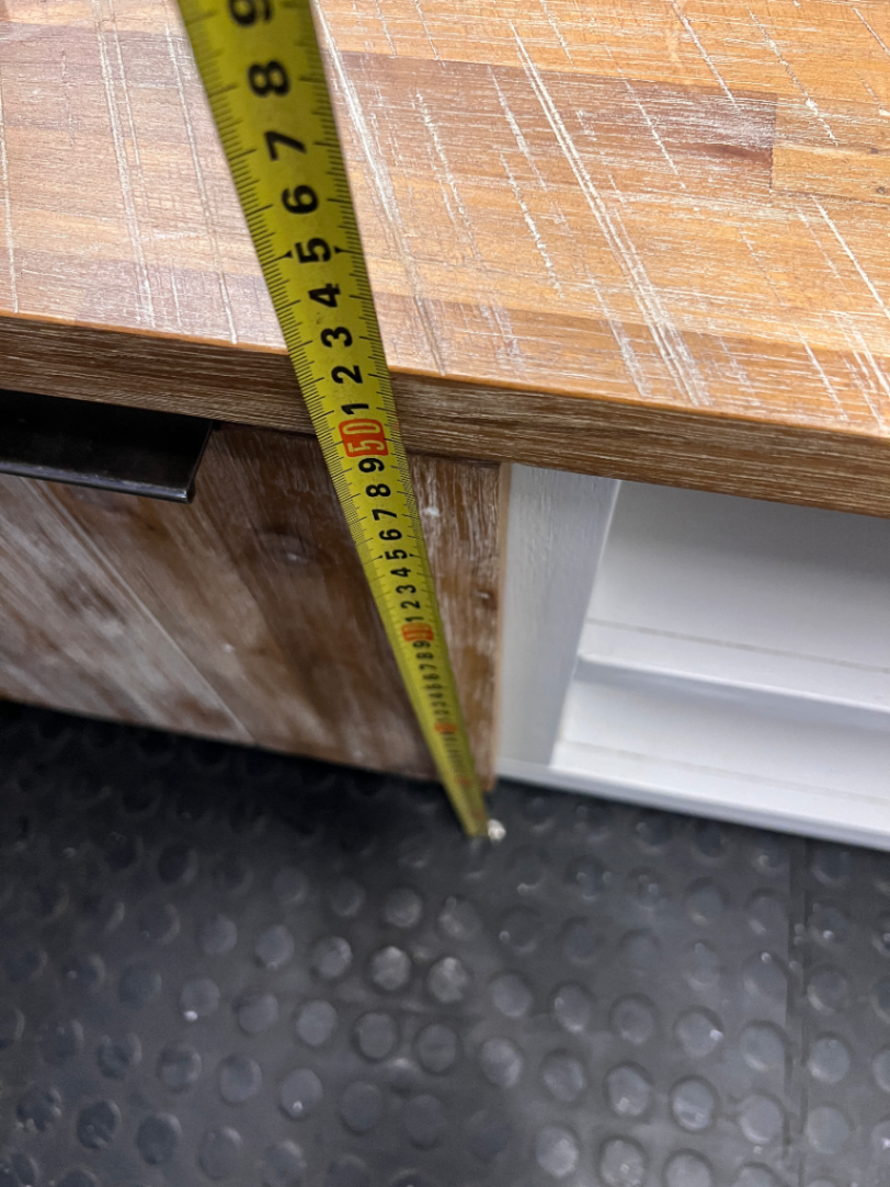 Cielo White and Natural Wood TV Unit — Mark from Candle Spillage on Surface