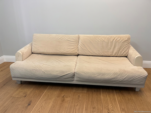 Classic Cream 2 Seater Couch with Low Profile Frame — Well Used Condition