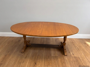 Classic Oval Wooden Trestle Dining Table — Fair Condition with Visible W - 2ndhandwarehouse.com