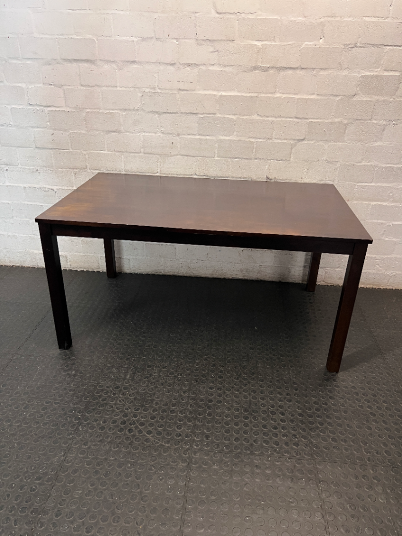 Classic Rectangular Wood-Tone Dining Table — Visible Wear and Surface Discolouration