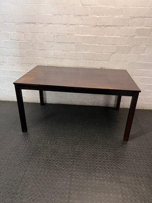 Classic Rectangular Wood-Tone Dining Table — Visible Wear and Surface Discolouration
