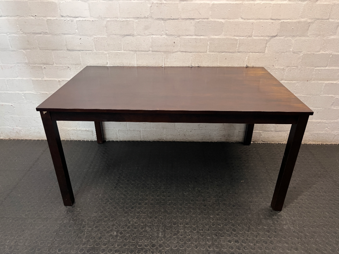 Classic Rectangular Wood-Tone Dining Table — Visible Wear and Surface Discolouration