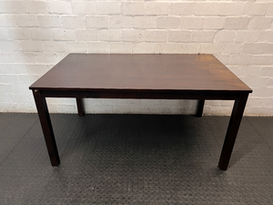 Classic Rectangular Wood-Tone Dining Table — Visible Wear and Surface Discolouration