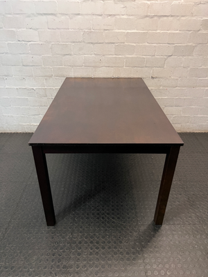 Classic Rectangular Wood-Tone Dining Table — Visible Wear and Surface Discolouration