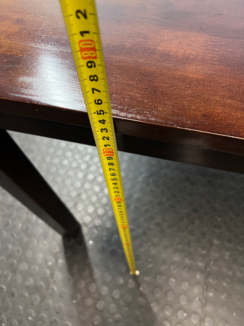 Classic Rectangular Wood-Tone Dining Table — Visible Wear and Surface Discolouration