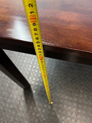 Classic Rectangular Wood-Tone Dining Table — Visible Wear and Surface Discolouration