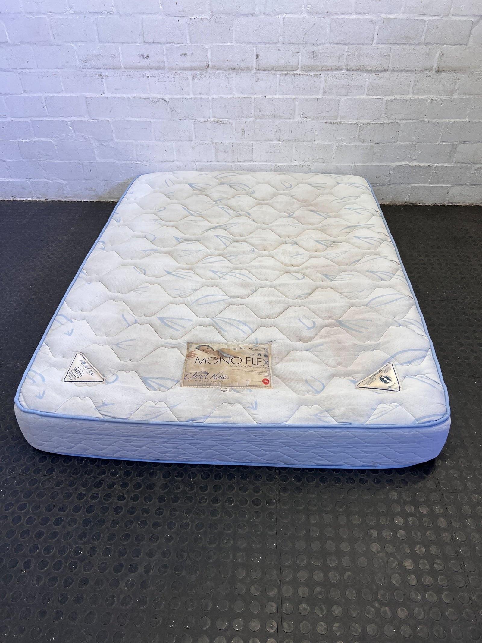 Comfortable Mono-Flex Queen Mattress – Soft Fabric, Minor Stains, Great Value