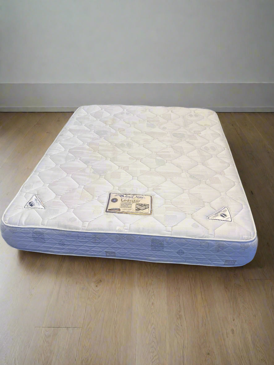 Comfortable White Lodestar Queen Mattress with Minor Wear