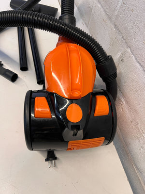 Compact Black and Orange Cylinder Vacuum Cleaner – Good Condition