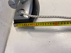 Compact Grey Steam Iron with Minor Wear – Not in Working Condition