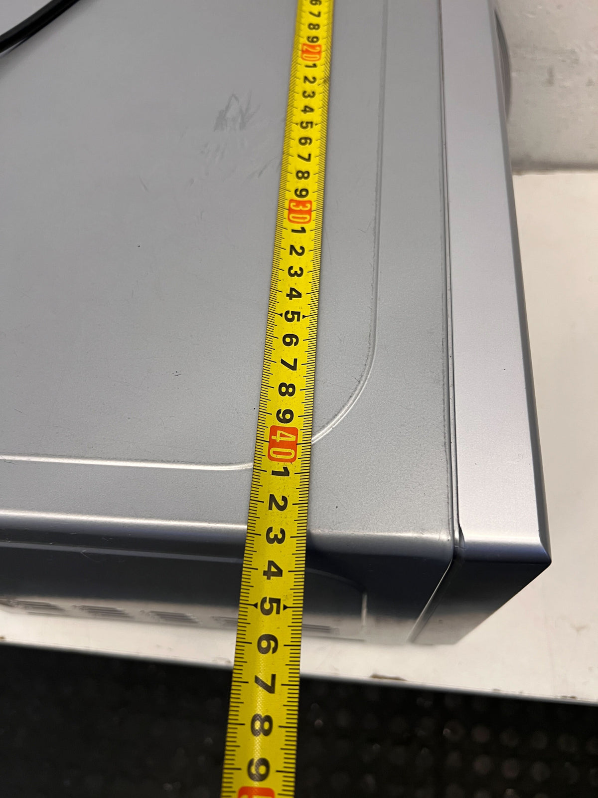 Compact Silver Univa Microwave - Excellent Condition with Minor Scratches - REDUCED