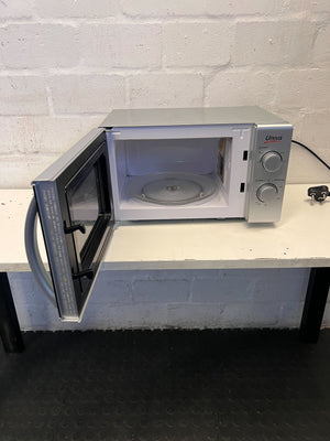 Compact Silver Univa Microwave - Excellent Condition with Minor Scratches - REDUCED