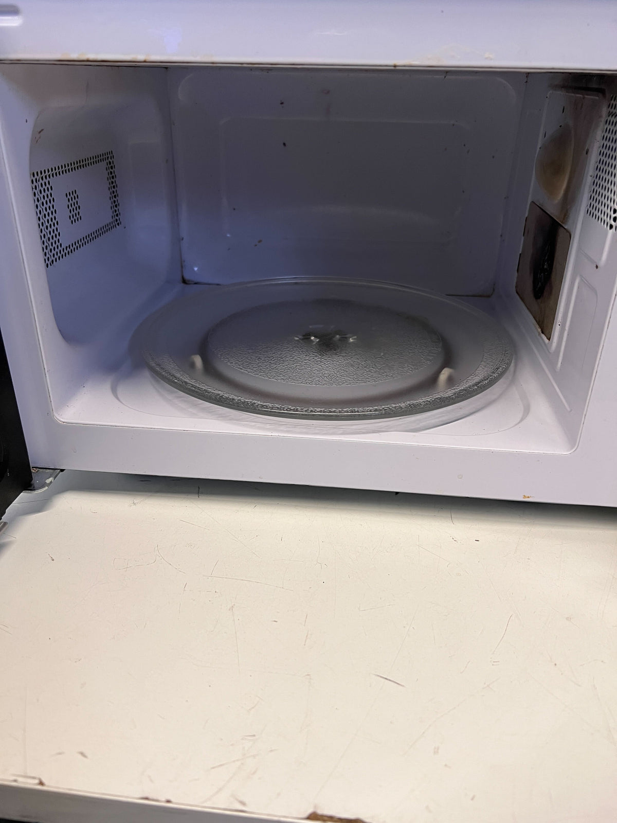 Compact Silver Univa Microwave - Excellent Condition with Minor Scratches - REDUCED