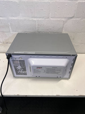 Compact Silver Univa Microwave - Excellent Condition with Minor Scratches - REDUCED