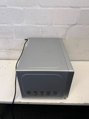 Compact Silver Univa Microwave - Excellent Condition with Minor Scratches - REDUCED