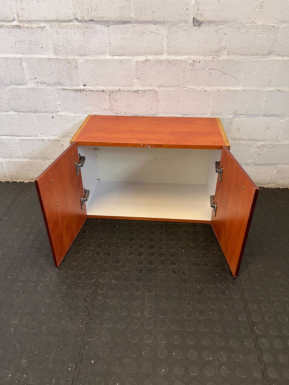 Compact Wood-Look Storage Cabinet with Modern Handles