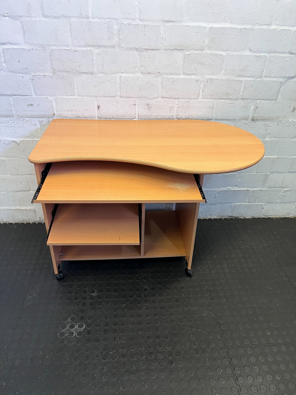 Compact Wooden Office Desk with Wheels and Curved Top