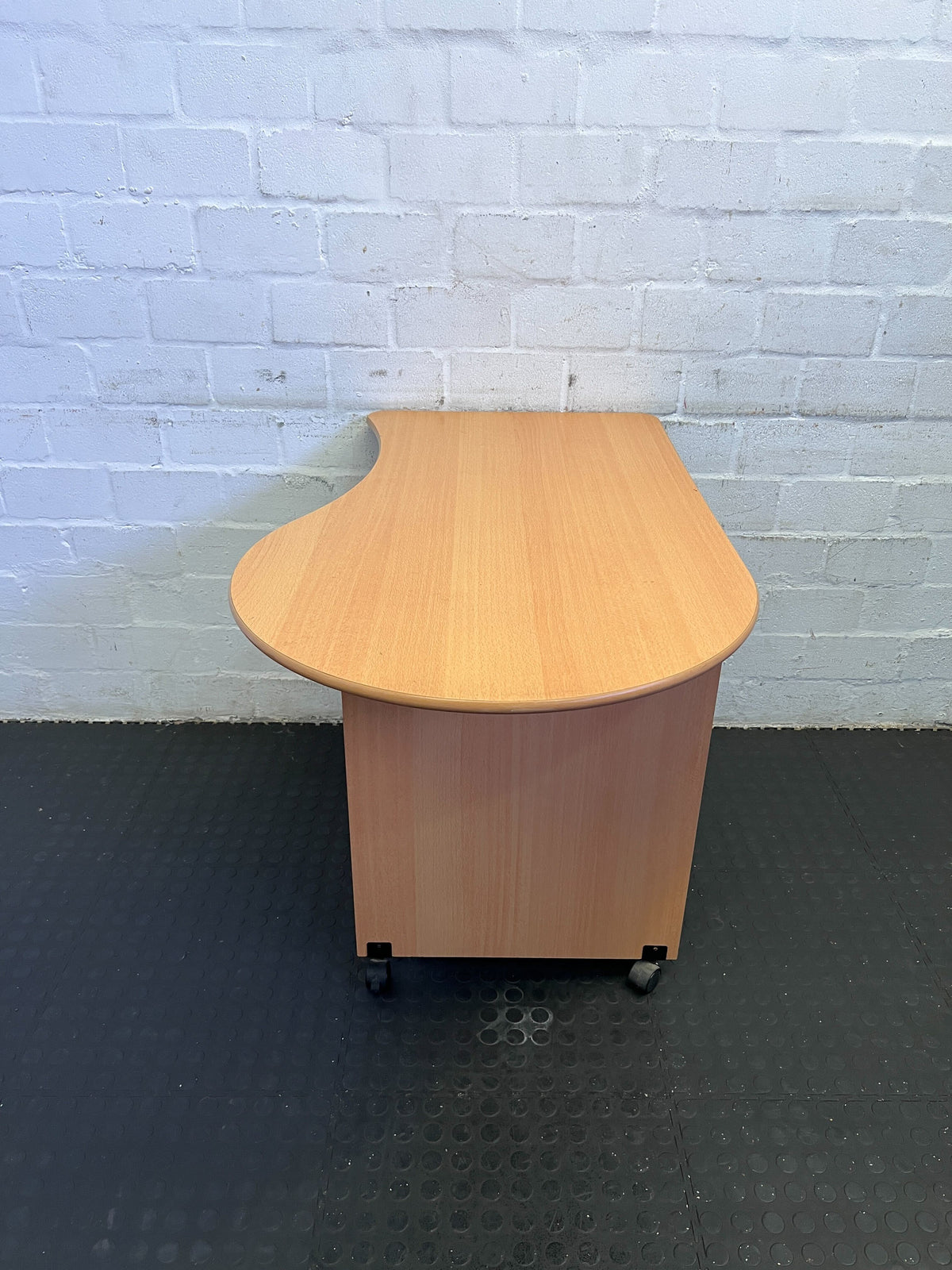 Compact Wooden Office Desk with Wheels and Curved Top