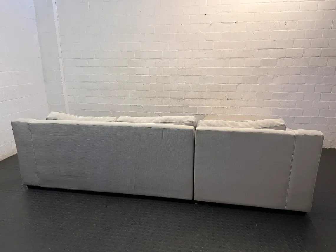Coricraft Grey Fabric L-Shaped Couch — Clean and Comfortable Condition