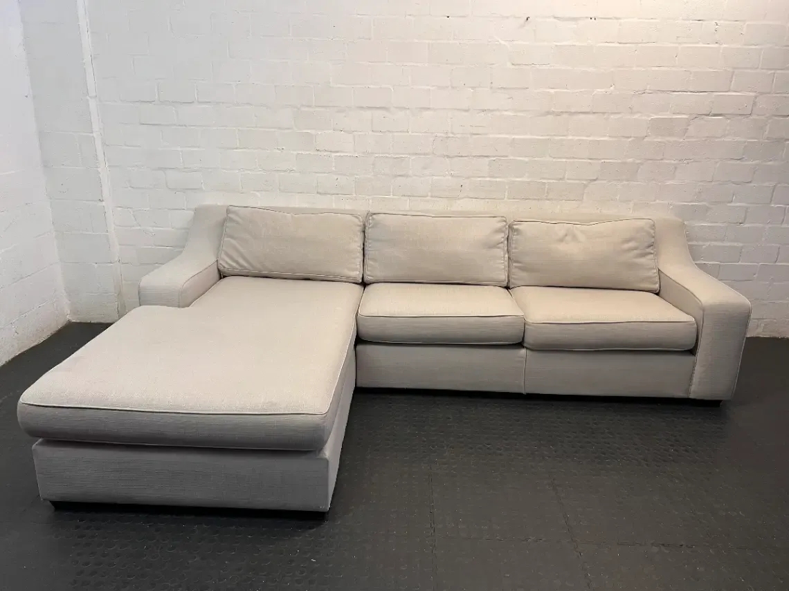 Coricraft Grey Fabric L-Shaped Couch — Clean and Comfortable Condition