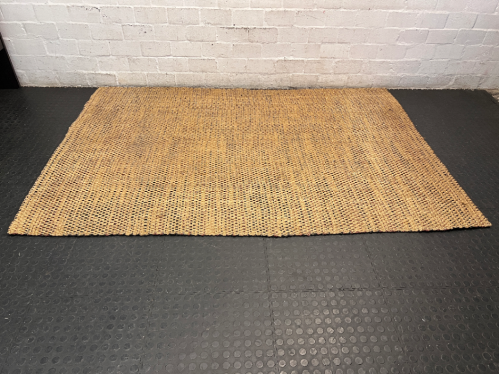 Coricraft Natural Woven Fiber Area Rug (240x160cm) — Fair Condition with Visible Wear