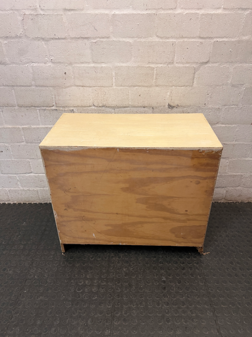 Cream Four-Drawer Chest with Moulded Panelling — Fair Condition with Visible Wear