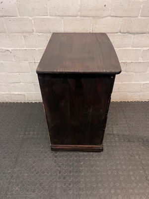 Dark Stained Wooden 4-Drawer Chest — Visible Wear and Surface Marks