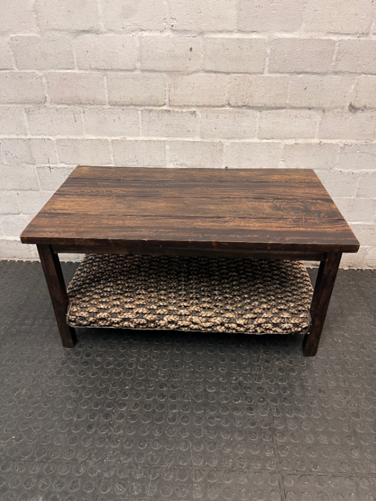 Dark Wood Coffee Table with Woven Storage Shelf — Used; Fair condition