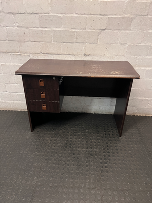 Dark Wood-Look Office Desk with Three Drawers — Poor Condition with Surface Wear