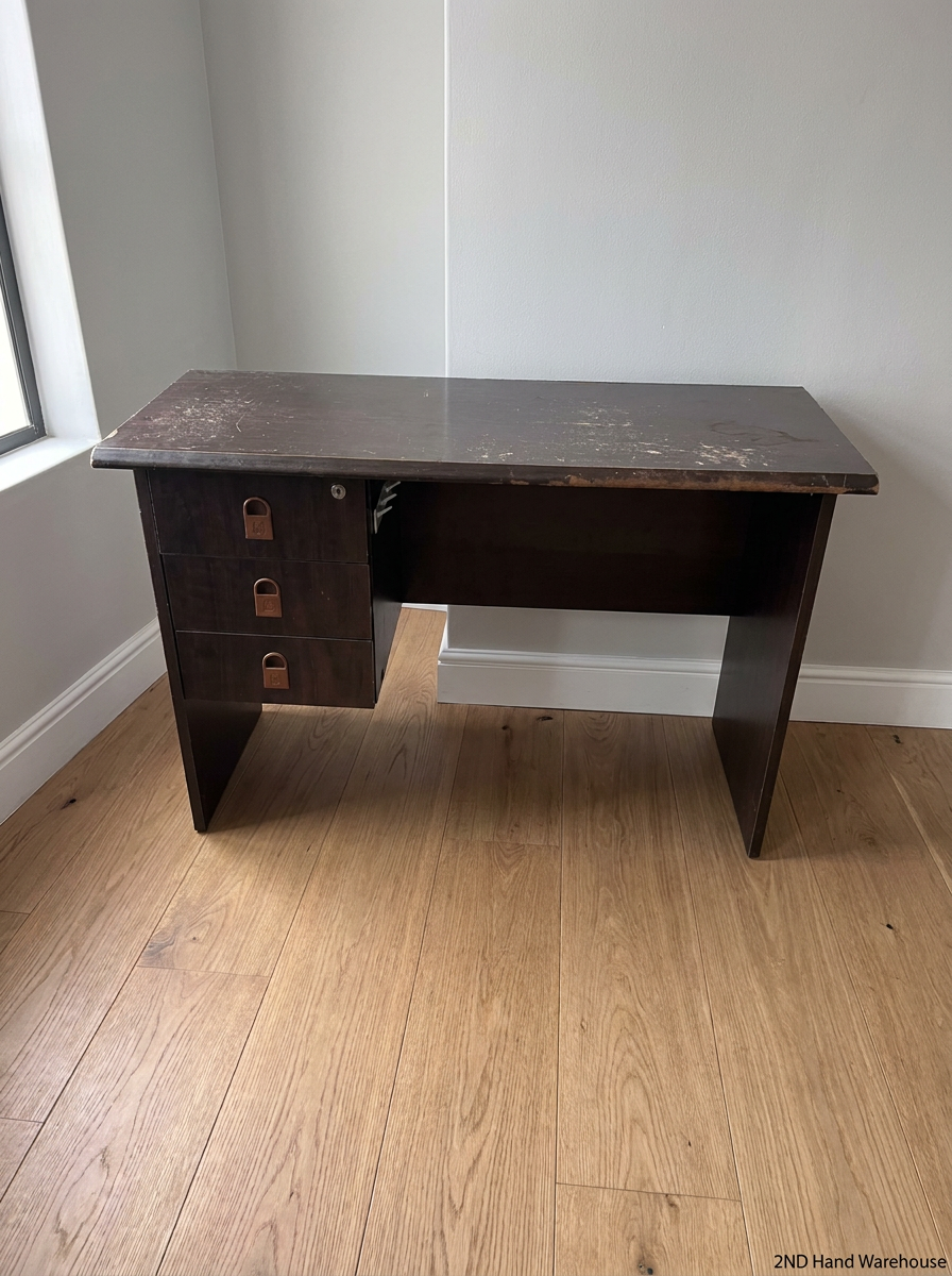 Dark Wood-Look Office Desk with Three Drawers — Poor Condition with Surface Wear