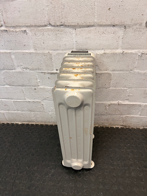 DeLonghi Oil-Filled Heater with Adjustable Thermostat — Working Order with Minor Exterior Rust