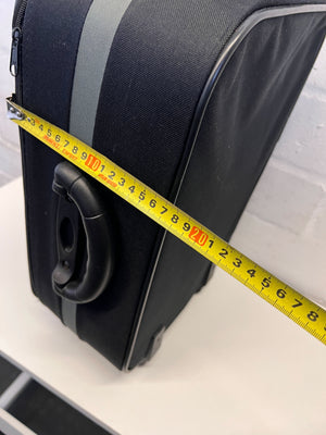 Elegant Black Rolling Travel Suitcase with Minor Wear