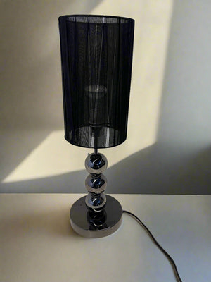 Elegant Black and Silver Table Lamp with Sheer Shade