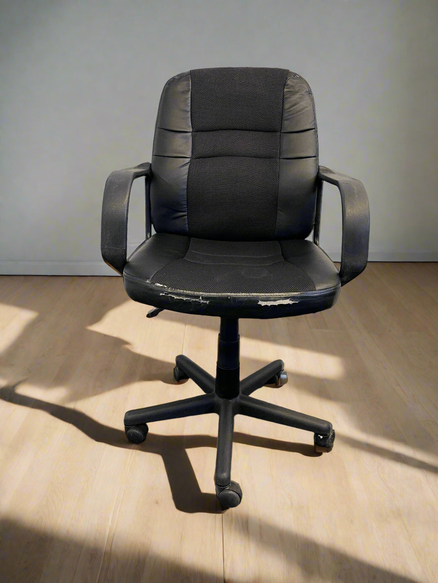 Ergonomic Black Office Chair with Minor Wear and Tear