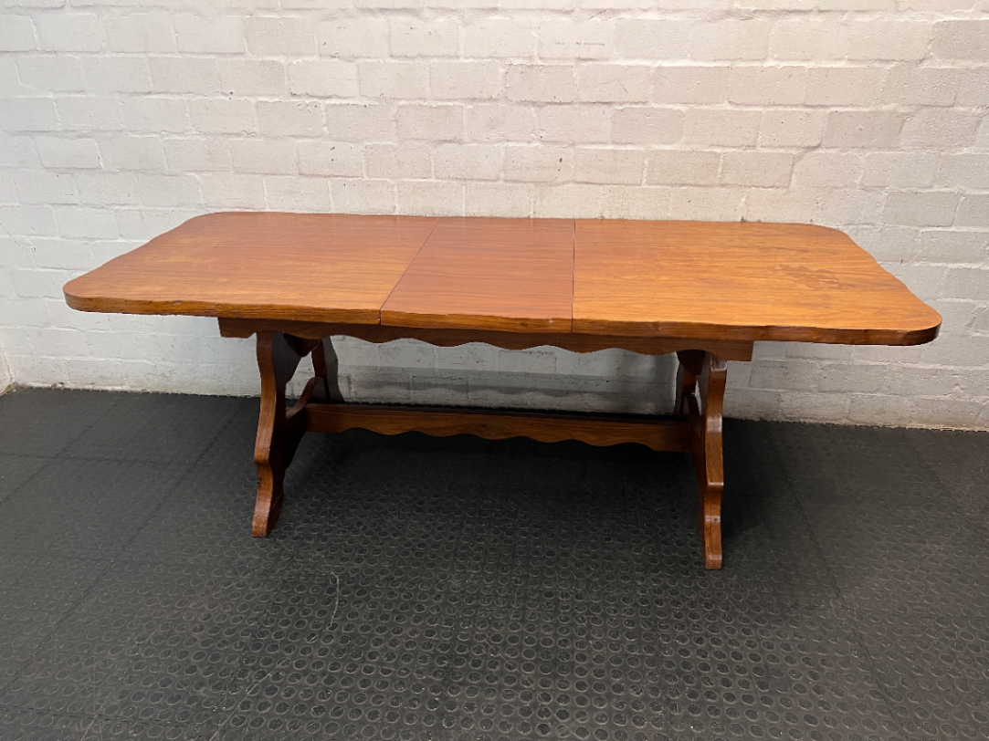 Extendable Wooden Trestle Dining Table — Visible Marks and Wear on Table Top
